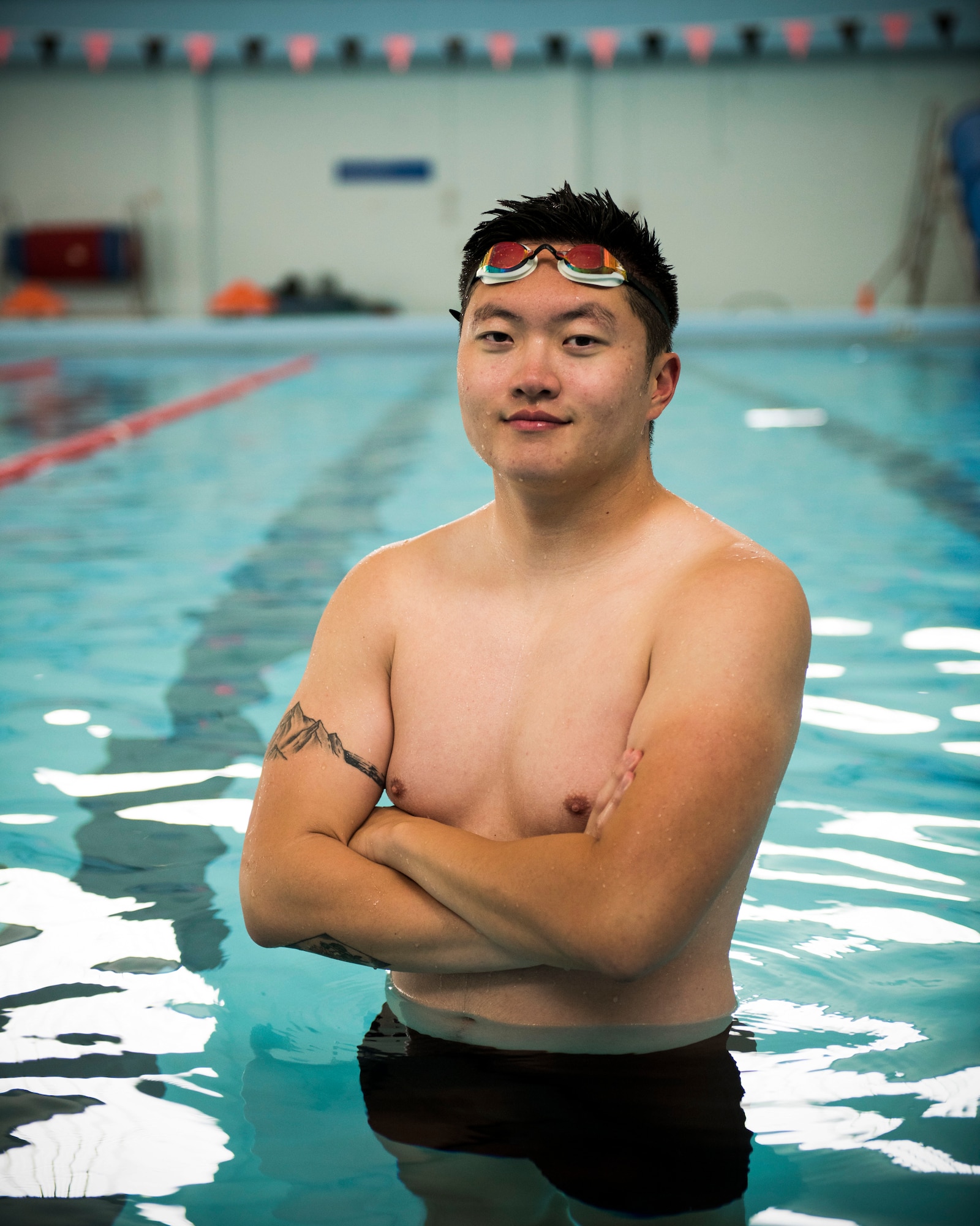 Airman 1st Class Micheal Yoo, 366th Maintenance Squadron, avionics backshop techinician, poses for a photo during his daily swim training September 18th, 2019, at Mountain Home Air Force Base, Idaho. Yoo is a competitor on the Air Force team in the world military games. (U.S. Air Force photo by Senior Airman Tyrell Hall)