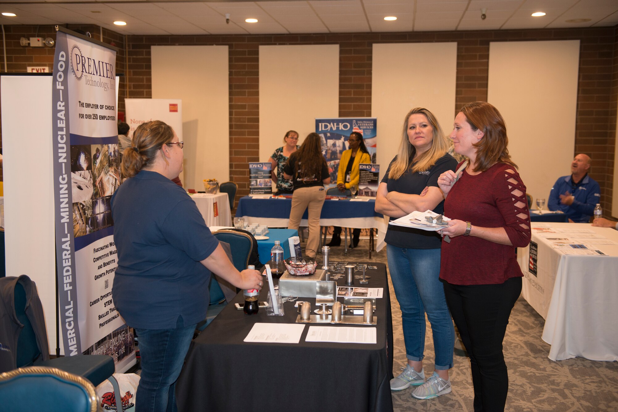 Base members attend several booths during the annual job fair event, sept 18, 2019, at Mountain Home Air Force Base, Idaho. The annual job fair was hosted to support taking care of Airmen and their families by showcasing over 57 employers. (U.S. Air Force photo by Senior Airman JaNae Capuno)