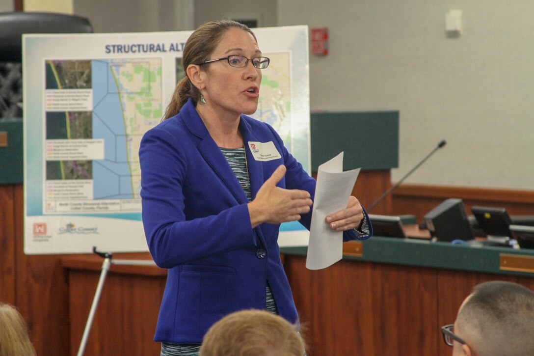 Susan Conner, Planning and Policy Branch chief for Norfolk District, U.S. Army Corps of Engineers, discusses coordinated project efforts and alternatives under consideration for the Collier County Coastal Storm Risk Management Feasibility Study at a public meeting in Naples, Florida, Sept. 9, 2019.