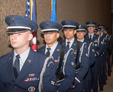 Joint Base Charleston honor guard members stand ready to present the colors and honor prisoners of war and missing in action at the Joint Base Charleston Air Force Ball, Sep. 14, 2019, in Charleston, S.C.