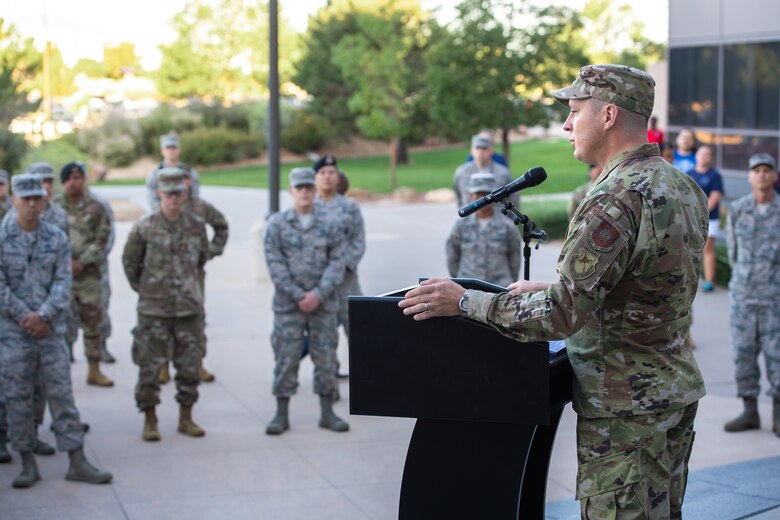 Col. Jack Fischer, 50th Space Wing vice commander, addresses Airmen at the Prisoner of War/Missing in Action Recognition Day ceremony at Schriever Air Force Base, Colorado, Sept. 20, 2019.  The POW/MIA remembrance ceremony allowed Airmen an opportunity to reflect and remember the service members missing, or captured during past and present wars. (U.S. Air Force photo by Katie Calvert)