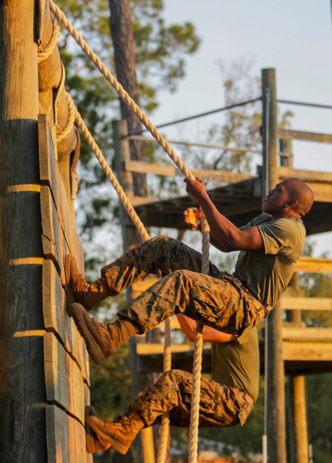 Recruits with Fox Company, 2nd Recruit Training Battalion, negotiate obstacles at the Confidence Course on Marine Corps Recruit Depot Parris Island, S.C. Sept. 17, 2019. The Confidence Course is composed of various obstacles that both physically and mentally challenge recruits. (U.S. Marine Corps photo by Lance Cpl. Dylan Walters)