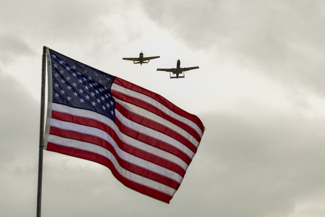 The A-10C Thunderbolt II Demonstration Team and A-1 Skyraider fly a Heritage Flight formation during the High Sky Wing AIRSHO in Midland, Texas, Sept. 16, 2018.  Following almost every performance, the A-10 teams up with a warbird to perform a widely recognized Heritage Flight formation flyover. (U.S. Air Force photo by Senior Airman Betty R. Chevalier)