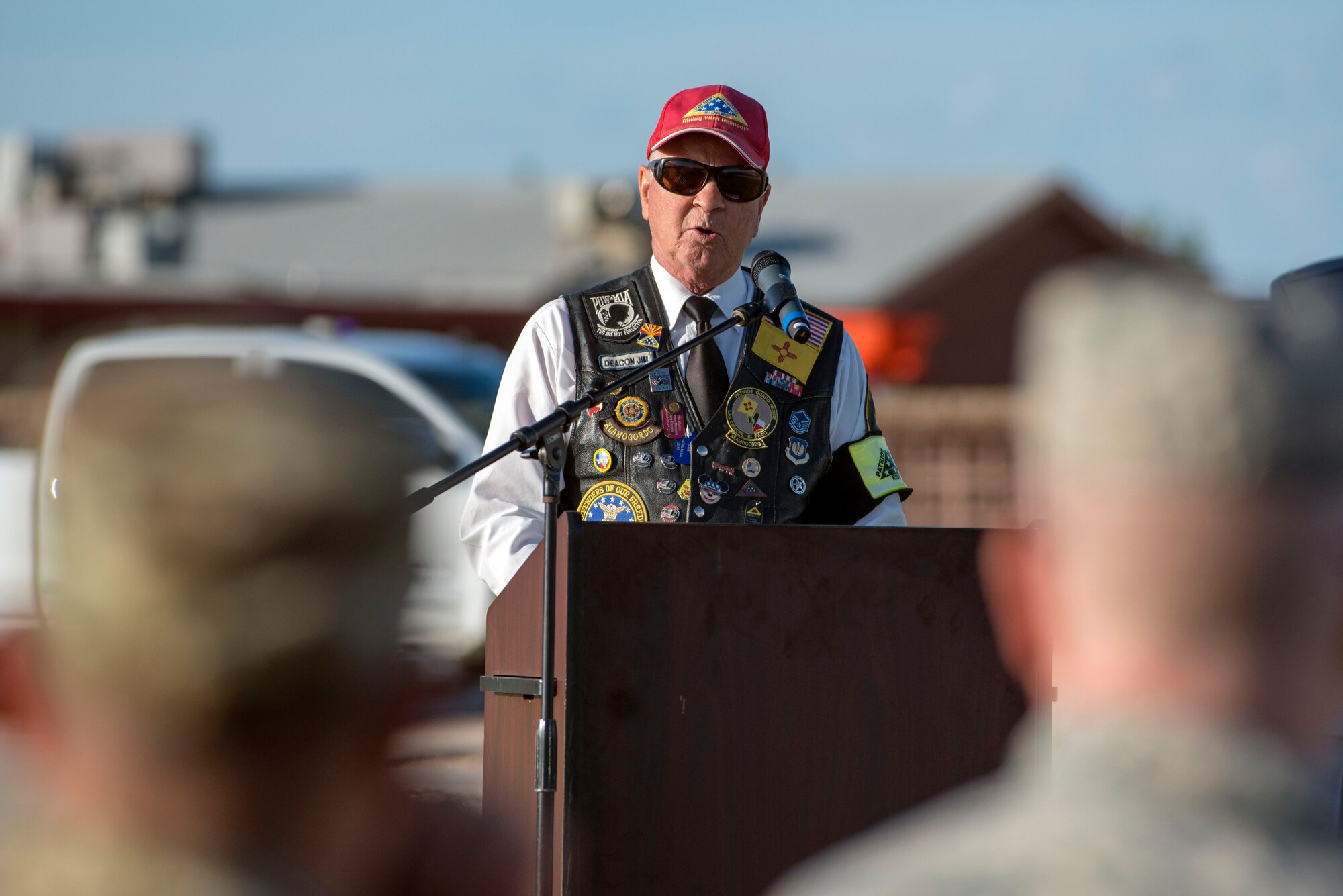 Deacon Jim Ernst, Patriot Guard Riders New Mexico State captain, speaks as the guest speaker during the POW/MIA Remembrance Ceremony on Holloman AFB, N.M., Sept. 20, 2019. Ernst spoke about the Patriot Guard Riders and their mission, as well as memorialized those imprisoned and missing-in-action. There are currently 12 unaccounted for New Mexican prisoners of war and missing in action military members. (U.S. Air Force photo by Staff Sgt. Christine Groening)