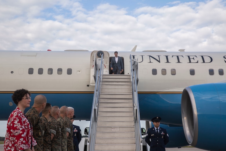 Secretary of Defense Dr. Mark Esper exits the plane at Marine Corps Air Station New River, N.C. Sept. 24 2019. Esper visited major operational commands and toured the base to view residual Hurricane Florence damage. (U.S. Marine Corps photo by Lance Cpl. Nicholas Guevara)