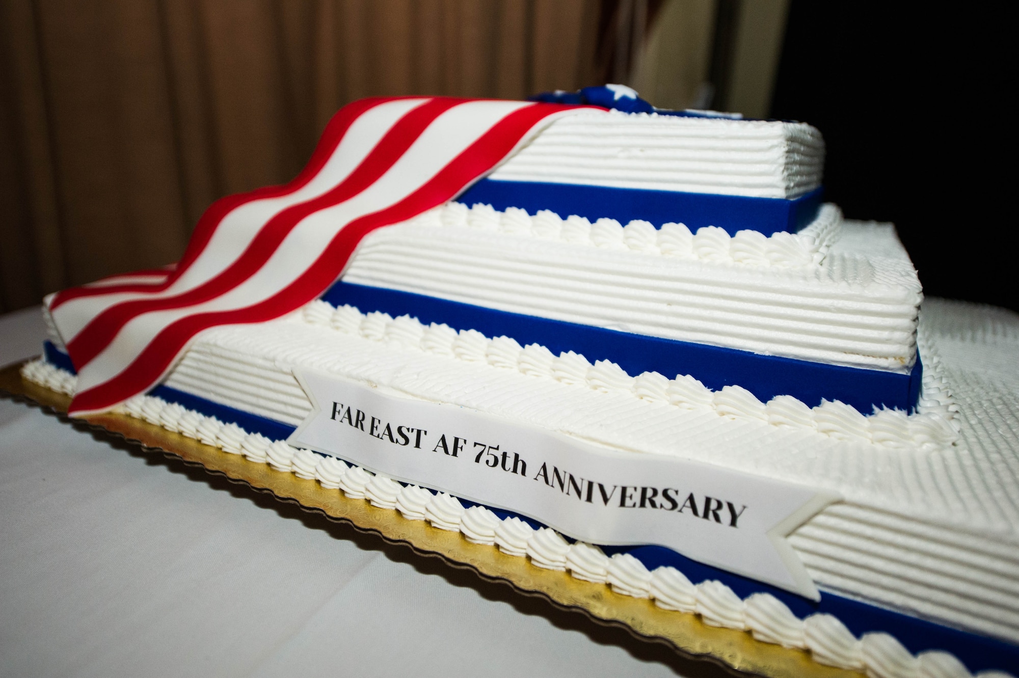 The Pacific Air Forces’ birthday cake sits on a table before the official ceremony takes place at the Air Force Ball, Honolulu, Hawaii, Sept. 20, 2019. This year, the United States Air Force celebrated its 72nd birthday and Pacific Air Forces celebrated its 75th anniversary. As part of the birthday and anniversary celebrations, six former PACAF commanders and command chiefs visited Hawaii and were guests of honor. (U.S. Air Force photo by Staff Sgt. Hailey Haux)