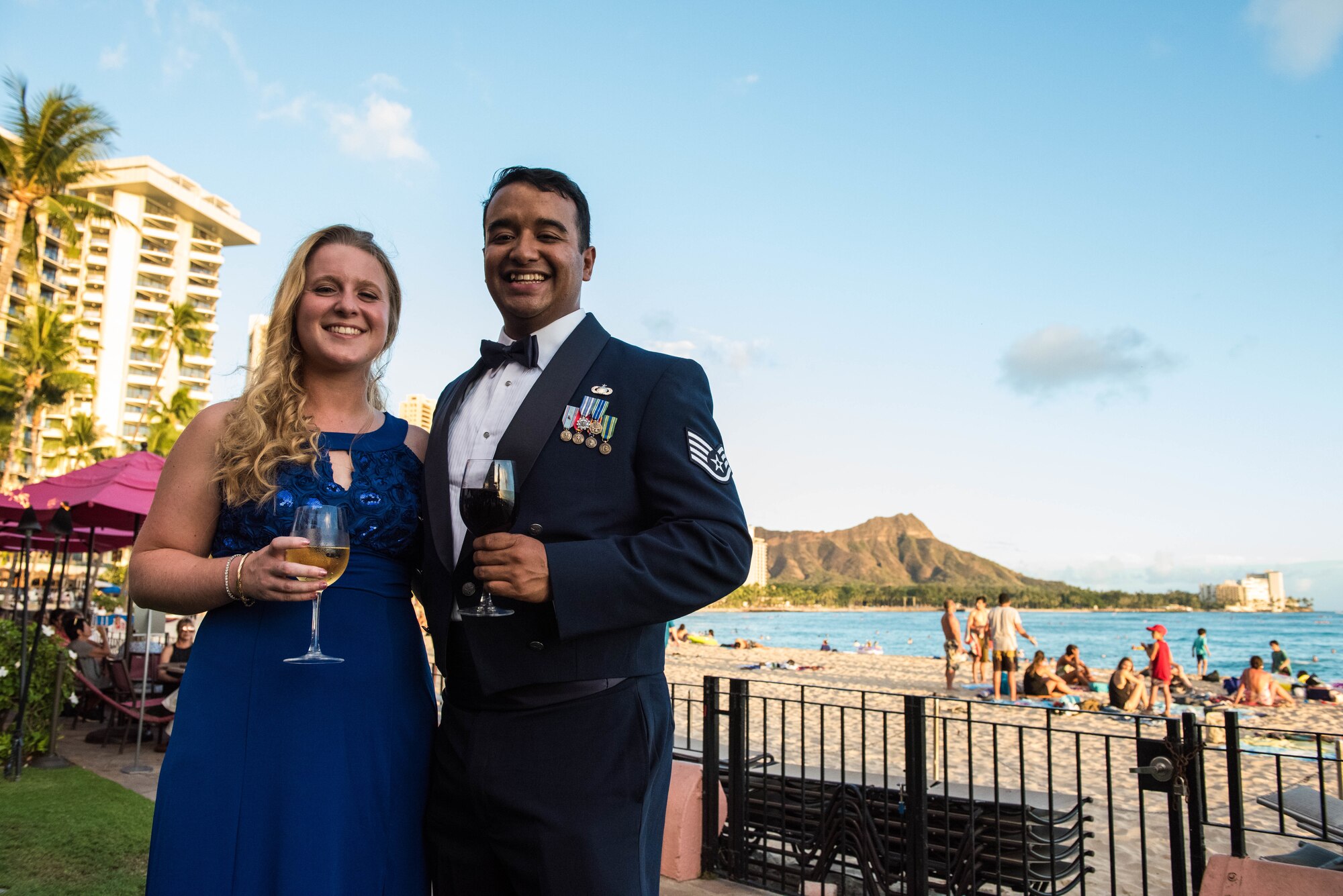 Staff Sgt. Daniel Robles, Pacific Air Forces Airman, and Emily Joy take a photo with Diamond Head in the background before the official ceremony takes place at the Air Force Ball, Honolulu, Hawaii, Sept. 20, 2019. This year, the United States Air Force celebrated its 72nd birthday and Pacific Air Forces celebrated its 75th anniversary. As part of the birthday and anniversary celebrations, six former PACAF commanders and command chiefs visited Hawaii and were guests of honor. (U.S. Air Force photo by Staff Sgt. Hailey Haux)