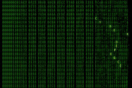 Green letters scroll on a computer screen, leaving a blur.  The letters "C Y B E R F L A G 19-1" are in bold.