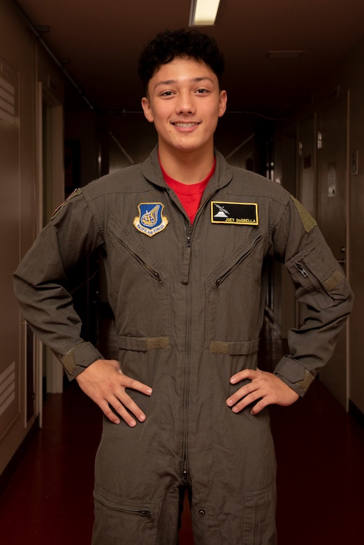 Joey DeGrella, Yokota High School senior and Junior Reserve Officer Training Corps. class commander, poses for a photo after changing into a flight suit with his very own name tapes during the 36th Airlift Squadron’s Pilot for a Day program, Sept. 20, 2019, at Yokota Air Base, Japan.