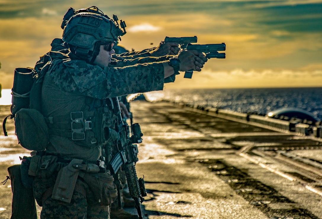 Marines pefrom live fire exercise.