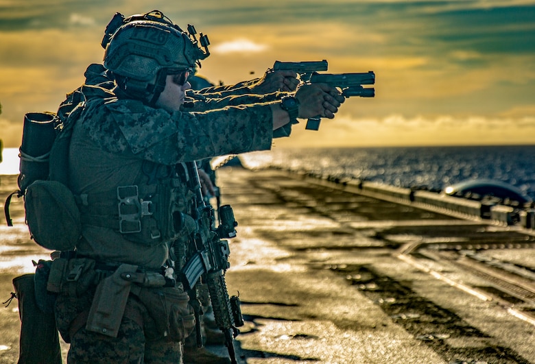 Marines pefrom live fire exercise.
