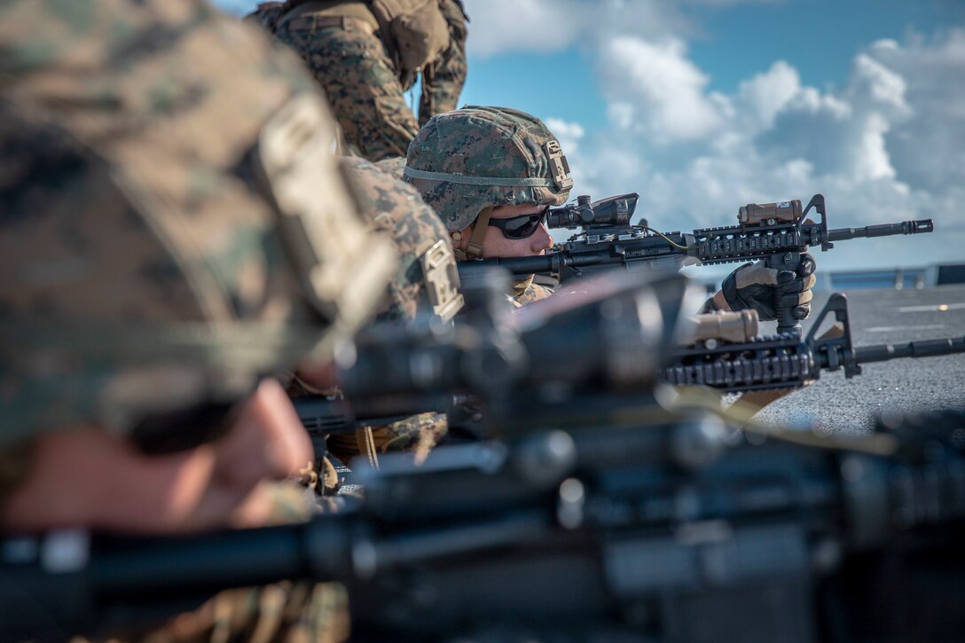 190601-M-ET529-0164 PACIFIC OCEAN (June 1, 2019) U.S. Marines with Headquarters and Service Company, Battalion Landing Team 3/5, 11th Marine Expeditionary Unit (MEU), conduct a battle sight zero range aboard the San Antonio-class amphibious transport dock ship USS John P. Murtha (LPD 26). The Marines and Sailors of the 11th MEU are deployed to the U.S. 7th Fleet area of operations to support regional stability, reassure partners and allies, and maintain a presence postured to respond to any crisis ranging from humanitarian assistance to contingency operations. (U.S. Marine Corps photo by Cpl. Israel Chincio)