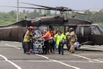 Puerto Rico National Guard helps airlift an ailing 28-day-old boy from Vieques to receive care at the University of Puerto Rico Hospital in Carolina Tuesday, Sept. 24, 2019, with the imminent arrival of Tropical Storm Karen.