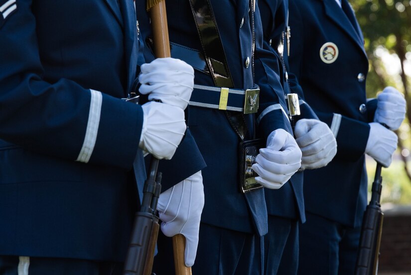 U.S. Air Force Airmen with the Langley Air Force Base Honor Guard wait to begin their duties at the closing ceremony of the POW/MIA event at Joint Base Langley-Eustis, Virginia, Sept. 20, 2019. Members of the base Honor Guard, along with other organizations on base, helped to honor POW/MIA military members of the past and present. (U.S. Air Force photo by Airman 1st Class Marcus M. Bullock)