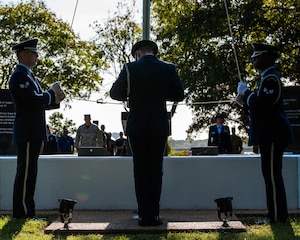 U.S. Air Force Airmen with the Langley Air Force Base Honor Guard raise the POW/MIA flag at Joint Base Langley-Eustis, Virginia, Sept. 20, 2019.  On the second day of the event, the POW/MIA flag was raised at the POW/MIA memorial on base. (U.S. Air Force photo by Airman 1st Class Marcus M. Bullock)