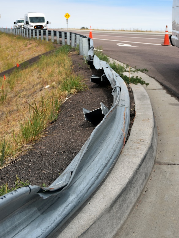 Crashes remain a possibility at the Peterson Air Force Base, Colorado east gate intersection with Marksheffel Road, where a recent collision damaged the guard rail along the right turn lane, pictured Sept. 23, 2019. Thanks to a partnership between Peterson's 21st Civil Engineer Squadron and the city of Colorado Springs, construction has begun on a proper traffic signal for the intersection, which should be complete by late October. (Air Force photo by Griffin Swartzell)