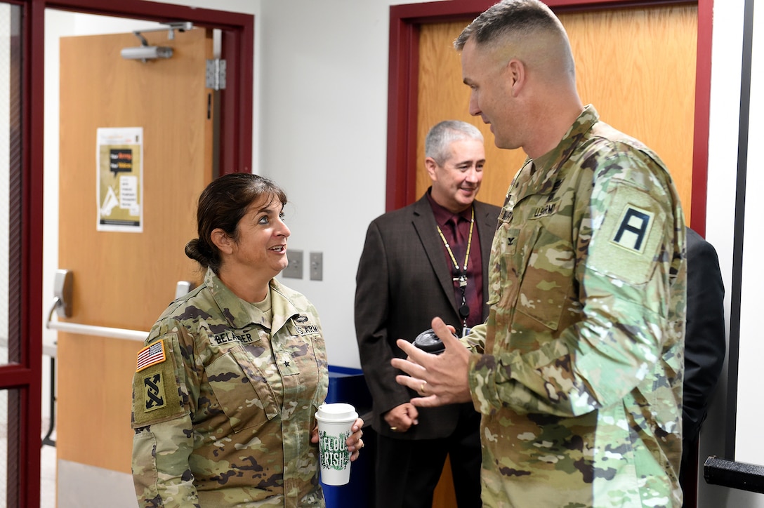 Brig. Gen. Kris A Belanger, Commanding General, 85th U.S. Army Support Command talks with Col. David Woodruff, 181st Infantry Brigade (MFTB) Commander, Fort McCoy, Wisconsin, during the New Brigade Command Teams training, September 21-22, 2019.