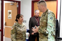 Brig. Gen. Kris A Belanger, Commanding General, 85th U.S. Army Support Command talks with Col. David Woodruff, 181st Infantry Brigade (MFTB) Commander, Fort McCoy, Wisconsin, during the New Brigade Command Teams training, September 21-22, 2019.