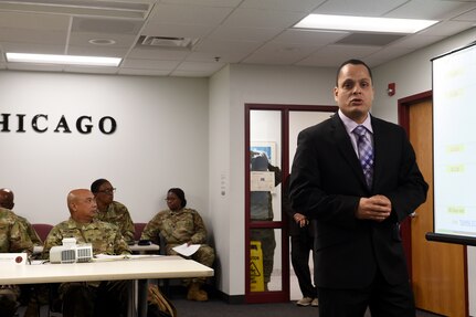 Paul O’Connell, G-3 Staff Operations and Training Specialist, 85th U.S. Army Reserve Support Command, talks about mission planning during the New Command Teams training brief, September 21-22, 2019.