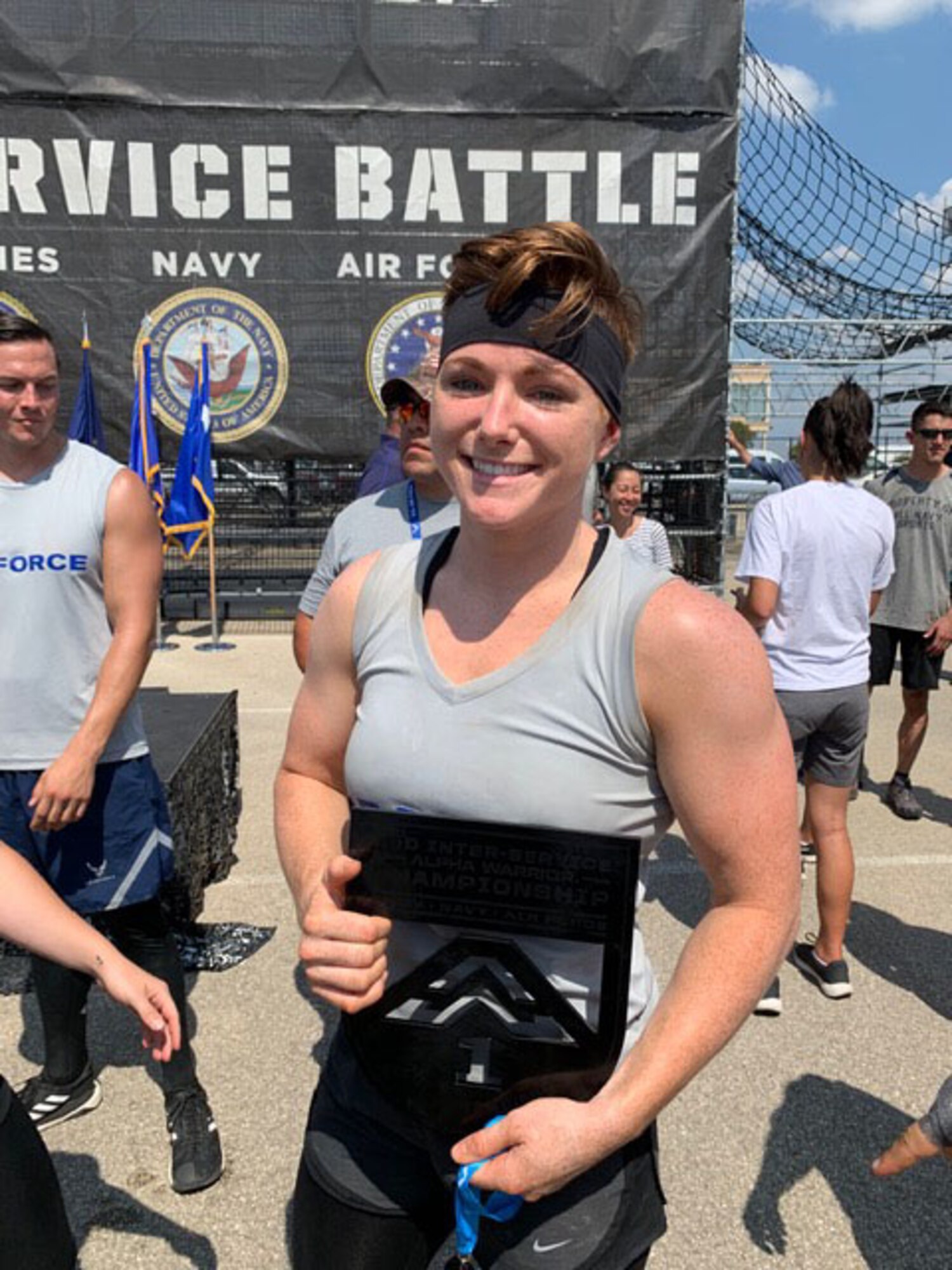 Second Lt. Michelle Strickland, 37th Flying Training Squadron student pilot, holds a plaque for the Alpha Warrior Inter-Service Championship, Sept. 14, 2019, at Retama Park in Selma, Texas. The Air Force obtained its second straight Alpha Warrior Inter-Service Championship over the Army and Navy. (Courtesy photo)