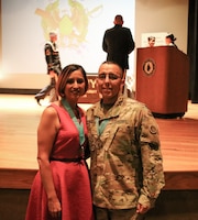 1st Sgt. Paul D. Gomez, first sergeant, Headquarters and Headquarters Company, Special Troops Battalion, 1st Theater Sustainment Command (TSC) and his wife, Jennifer, attend the Sergeant Audie Murphy induction/Margaret C. Corbin award ceremony on Fort Knox, Ky., May 30, 2019. Jennifer Gomez received the Margaret C. Corbin award for her volunteerism.