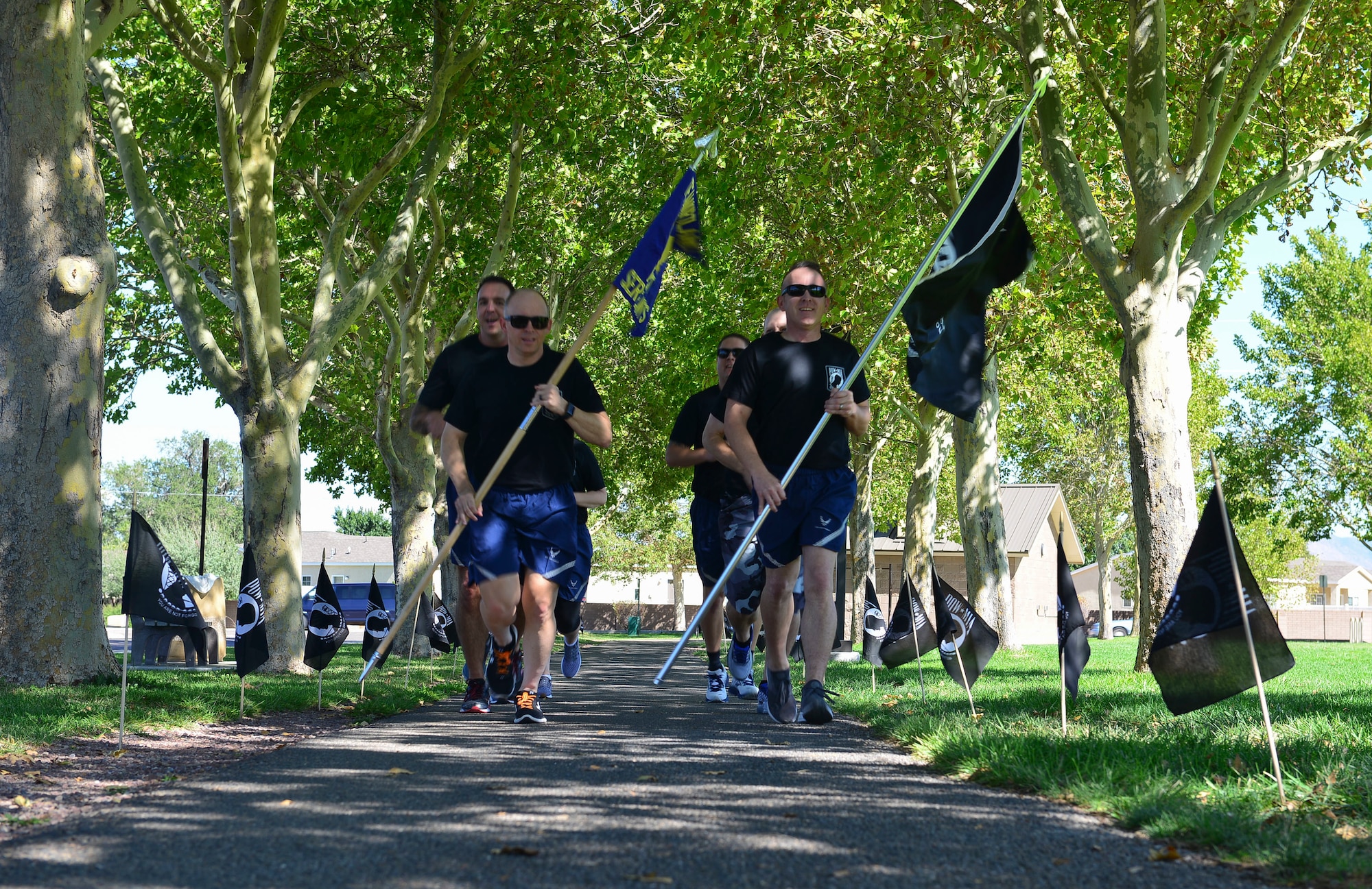 Team Kirtland First Sergeants begin the 24-hour run or walk at Kirtland Air Force Base, N.M., Sept. 19, 2019. More than 150 members of Team Kirtland participated in the annual POW/MIA event. (U.S. Air Force photo by Senior Airman Enrique Barceló)