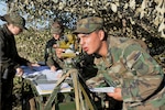 Moldovan Artillery soldiers prepare a fire mission during Operation Fire Shield 2019 hosted by Moldova Sept. 12, 2019, at Bulboaca Training Area, Moldova.   Fire Shield’s mission is sharing knowledge and best practices among the North Carolina and Alabama National Guard artillery experts, Moldovan soldiers and officers and other nations attending the annual event. The NCNG has teamed with Moldova for more than two decades via the State Partnership Program designed to increase peace and stability across Europe.