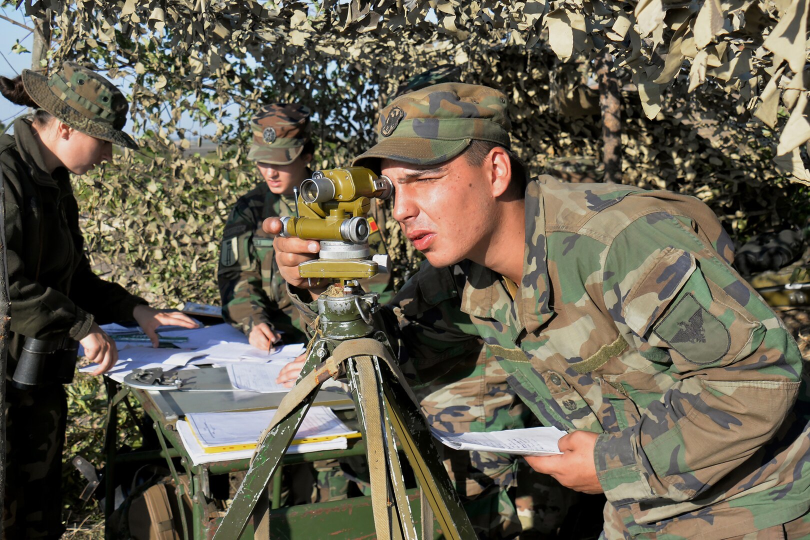 Moldovan Artillery soldiers prepare a fire mission during Operation Fire Shield 2019 hosted by Moldova Sept. 12, 2019, at Bulboaca Training Area, Moldova.   Fire Shield’s mission is sharing knowledge and best practices among the North Carolina and Alabama National Guard artillery experts, Moldovan soldiers and officers and other nations attending the annual event. The NCNG has teamed with Moldova for more than two decades via the State Partnership Program designed to increase peace and stability across Europe.
