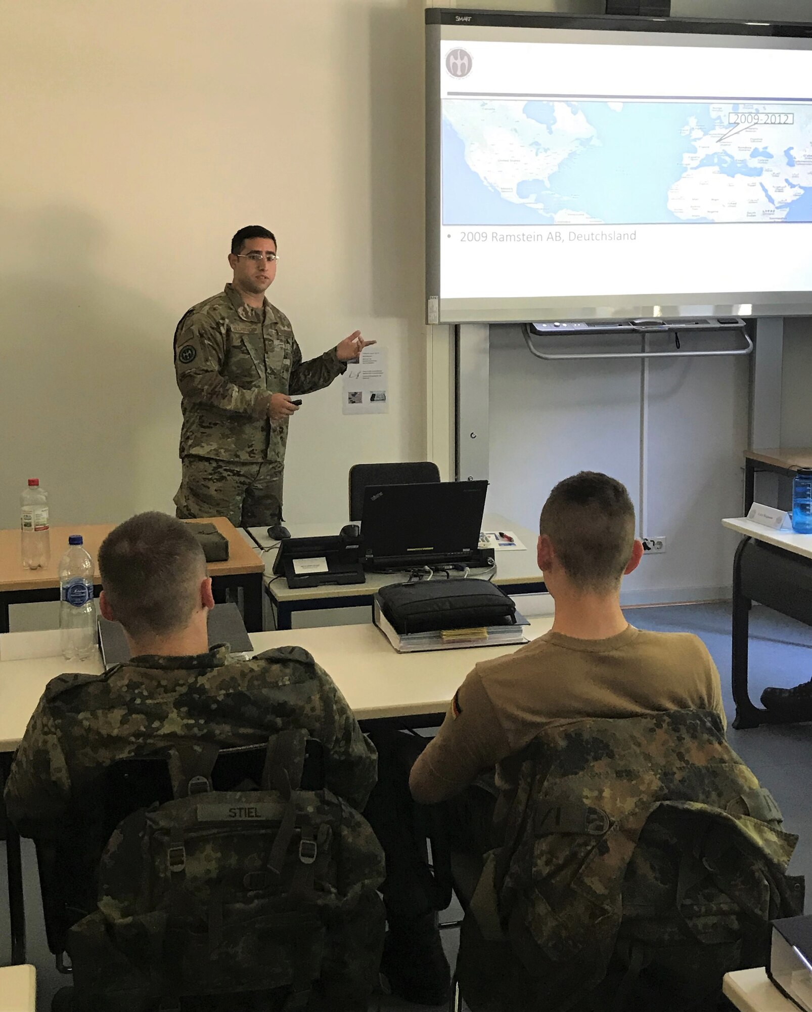 U.S. Air Force Tech. Sgt. Emmanuel Villasenor, German NCO Academy instructor, gives a U.S. Air Force enlisted corps presentation to German Senior NCOA students June 25, 2019 at the academy on Marseille Kaserne, Appen, Germany. Villasenor is one of only three enlisted members in Europe serving under the U.S. Air Force Military Personnel Exchange Program. (Courtesy photo)