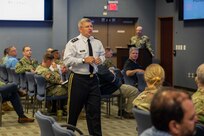 Joint Task Force Civil Support (JTF-CS) Commanding General U.S. Army Maj. Gen. William “Bill” Hall speaks to JTF-CS members during an all hands call at the command’s headquarters. Also during the all hands call the command received suicide prevention training. (Official DoD photo by Mass Communication Specialist 3rd Class Michael Redd/RELEASED)