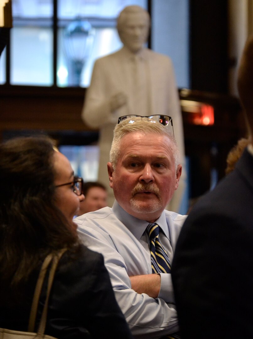 Jon Lightner, center, DLA Troop Support chief counsel and panel speaker at a local law school education event, listens to questions from local law students at an education and networking event Sept. 19, 2019 in Philadelphia.