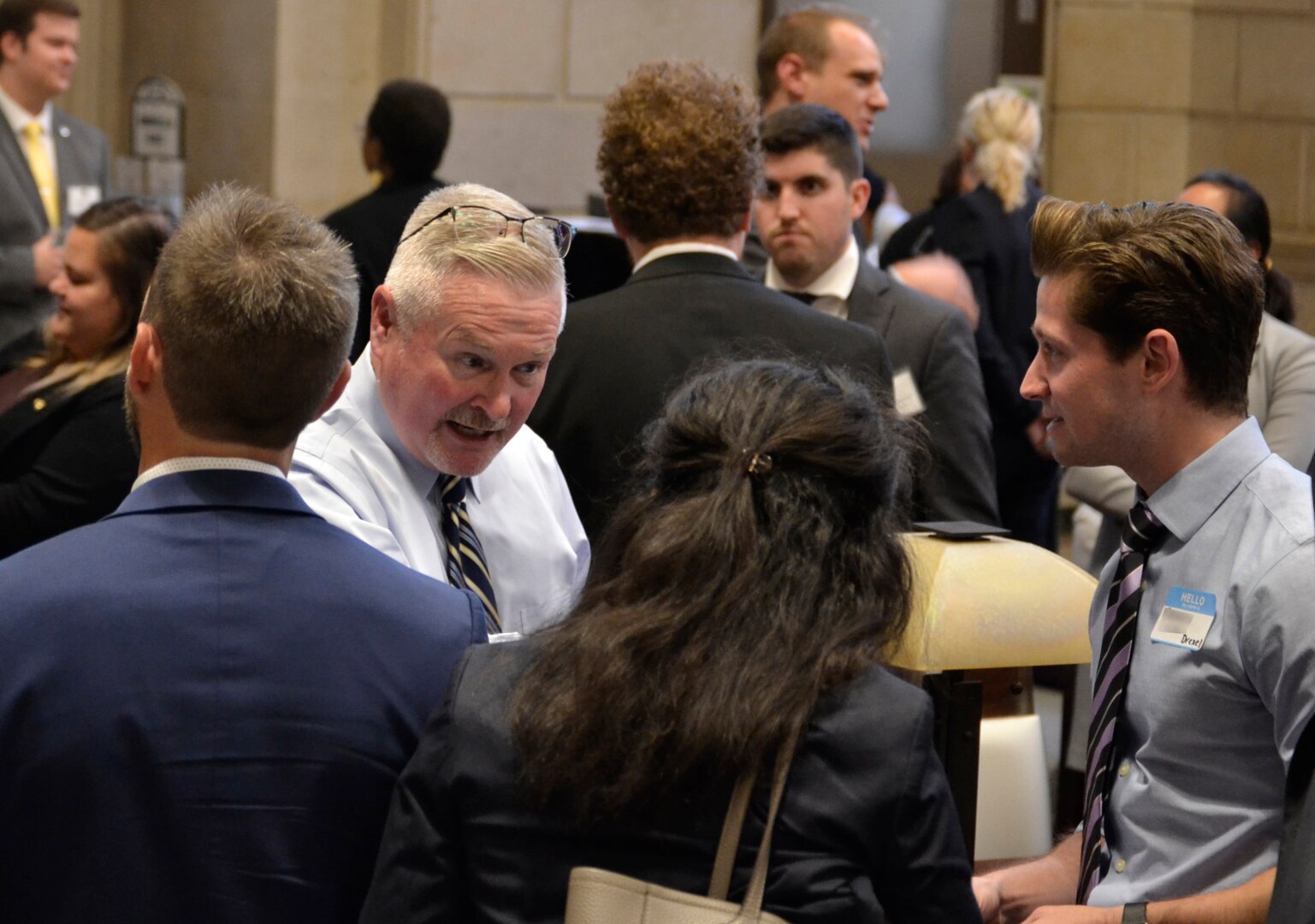 Jon Lightner, DLA Troop Support chief counsel and panel speaker at a local law school education event, and members of his office network with law students and provide information on federal employment as DLA attorneys Sept. 19, 2019 in Philadelphia.