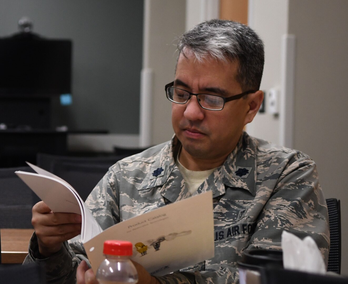 A student from the Air Force Post Graduate Dental School surgical skills and readiness course reviews the material during a lecture at the AFPDS, Joint Base San Antonio-Lackland Sept. 18. The training is a combination of three courses being run simultaneously to maximize use of resources and time.