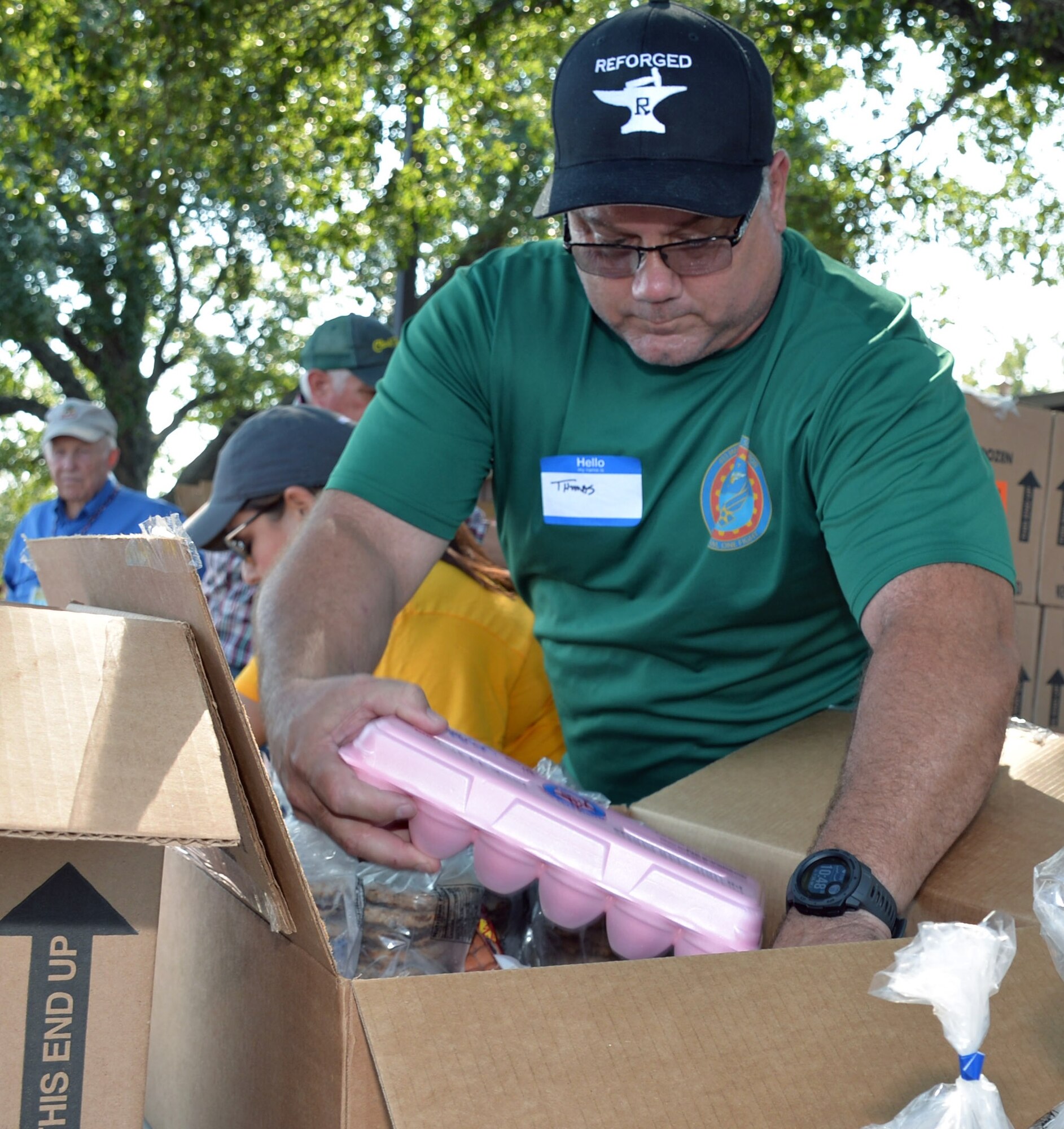 Master Sgt. Thomas Taylor Jr., 433rd Maintenance Squadron aerospace ground equipment technician, assembles packages of cold and frozen goods during a San Antonio Food Bank distribution event at Windcrest United Methodist Church Sept. 19. Fifteen Reserve Citizen Airmen from the 433rd Airlift Wing and 960th Cyberspace Wing participated in three distribution events over two days.