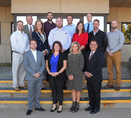 Program managers from the Air Force Life Cycle Managment Center at Hill Air Force Base, Utah, and course advisors gather for a group photo Sept. 25, 2019.