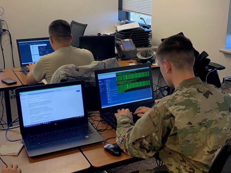 Team works on computers