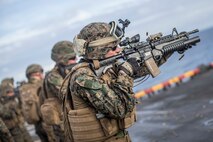 U.S. Marines with Lima Company,  Battalion Landing Team 3/5, 11th Marine Expeditionary Unit, fire at targets during a live-fire range aboard the amphibious assault ship USS Boxer. The Marines and Sailors of the 11th MEU are deployed to the U.S. 7th Fleet area of operations to support regional stability, reassure partners and allies, and maintain a presence postured to respond to any crisis ranging from humanitarian assistance to contingency operations.