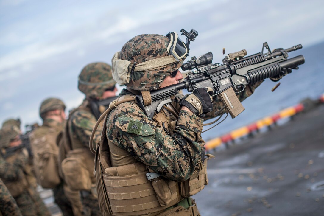 U.S. Marines with Lima Company,  Battalion Landing Team 3/5, 11th Marine Expeditionary Unit, fire at targets during a live-fire range aboard the amphibious assault ship USS Boxer. The Marines and Sailors of the 11th MEU are deployed to the U.S. 7th Fleet area of operations to support regional stability, reassure partners and allies, and maintain a presence postured to respond to any crisis ranging from humanitarian assistance to contingency operations.