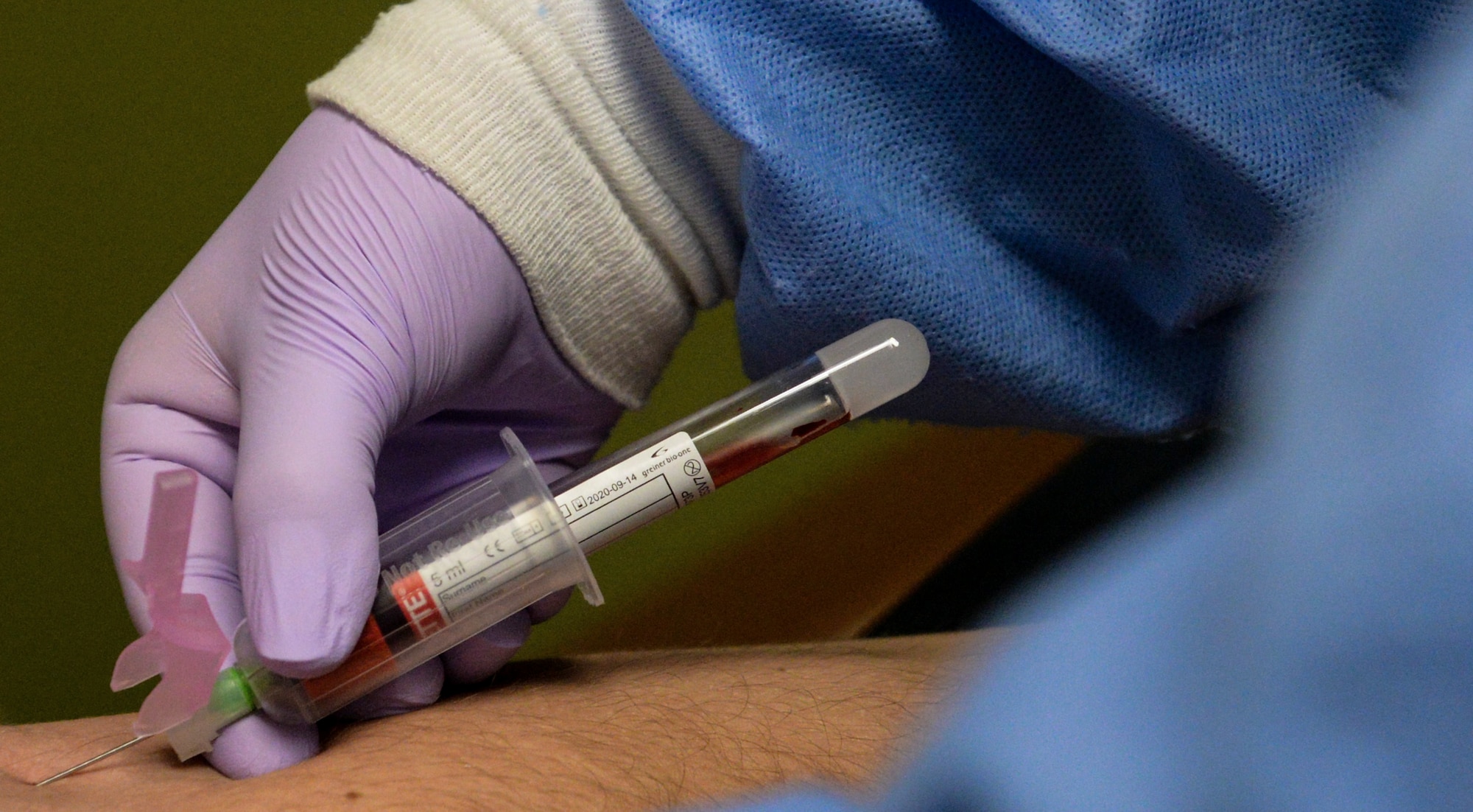 Airman First Class Miranda Batemen, 9th Medical Group laboratory technician, draws blood from her patient at Beale Air Force Base, California, Sept. 24, 2019. Laboratory technicians use multiple different types of needles to ensure proper blood flow from patients. (U.S. Air Force photo by Staff Sgt. Taylor White)