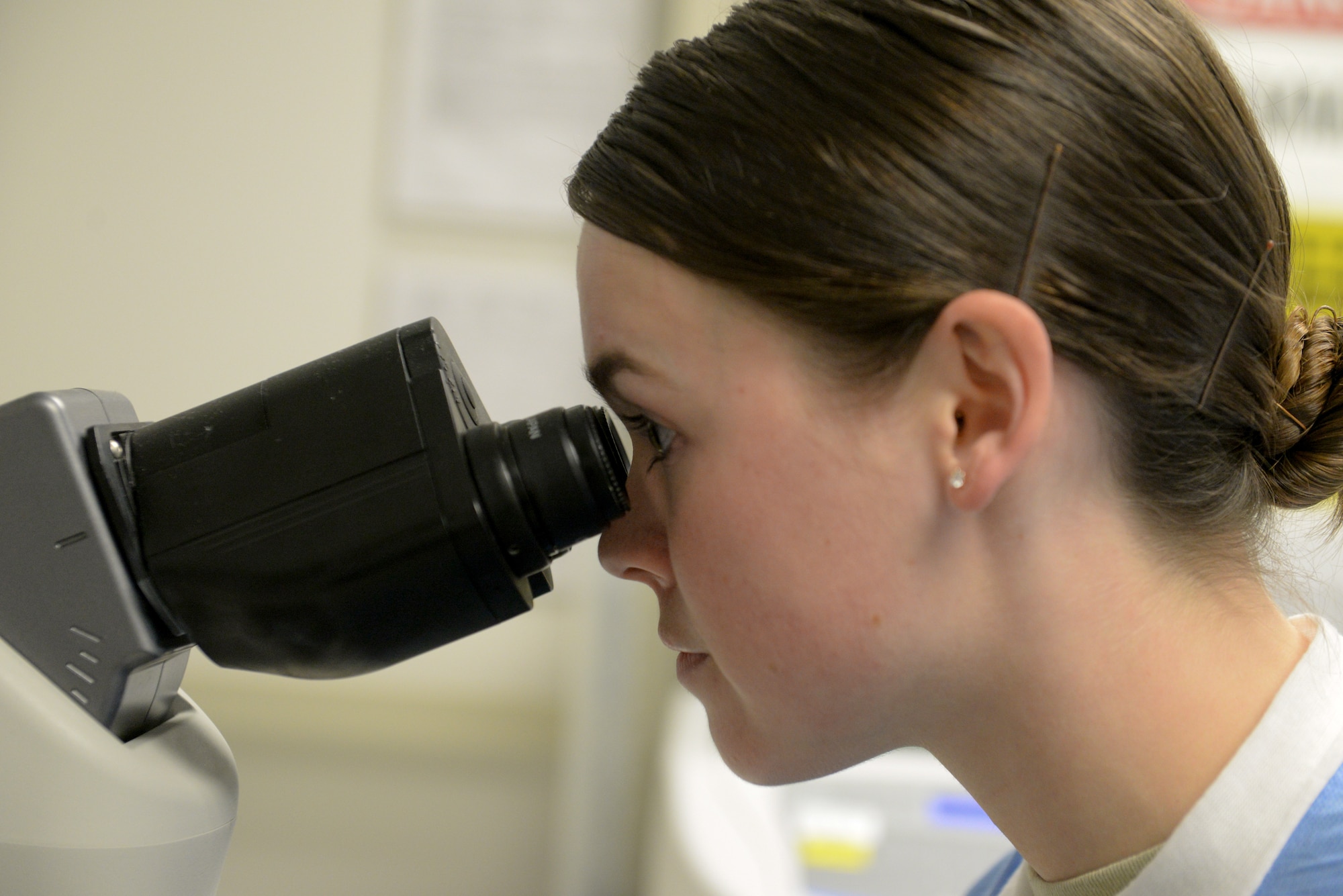 Senior Airman Rhian Owen, 940th Aerospace Medical Squadron laboratory technician, examines a sample at Beale Air Force Base, California, Sept. 24, 2019. Lab technicians are responsible not only for drawing blood, but for chemistry examination and more. (U.S. Air Force photo by Staff Sgt. Taylor White)