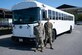 U.S. Air Force Staff Sgt. Christopher Carpe, 81st Logistics Readiness Squadron ground transportation and equipment support NCO in charge, and Airman 1st Class Jared Hill, ground transportation personnel, pose for a photo on Keesler Air Force Base, Sept. 26, 2019. Carpe and Hill assisted in transporting elderly residents of the Seashore Oaks Assisted Living Facility away from the area after a fire evacuation. (U.S. Air Force photo by Airman 1st Class Kimberly L. Mueller)