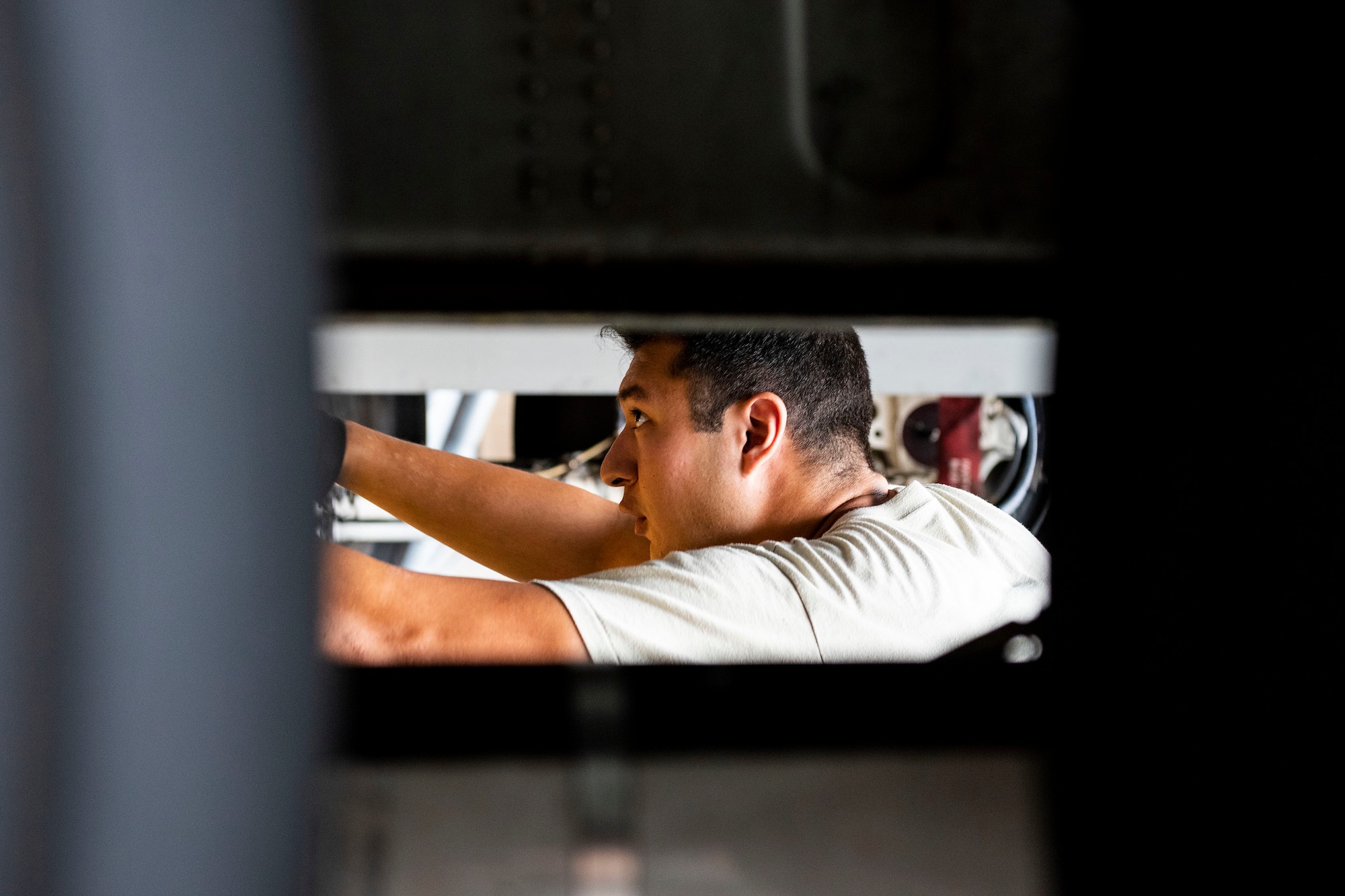 Staff Sgt. George Lorr, 71st Aircraft Maintenance Unit crew chief, coordinates the alignment of shorings to associated fuselage stations during preparation of an HC-130J Combat King II for a situational awareness communication upgrade (SACU) modification Sept. 25, 2019, at Moody Air Force Base, Ga. The shorings allow the aircraft to be put into a state of “no-loading”, where the pressure and weight of the aircraft will be reduced, allowing the modifications to be implemented without damage to the aircraft’s hull integrity.  This SACU will enhance the aircraft’s ability to communicate with personnel on the ground during search and rescue operations. (U.S. Air Force photo by Senior Airman Erick Requadt)
