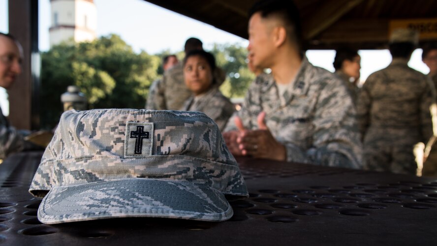 A chaplain’s hat sits on a table at Barksdale Air Force Base, Louisiana, Sept. 12, 2019. The Air Force Chaplain Corps has introduced a new initiative that rolls back some administrative responsibilities to allow more time for chaplains to engage with their units. (U. S. Air Force photo by Airman 1st Class Jacob B. Wrightsman)