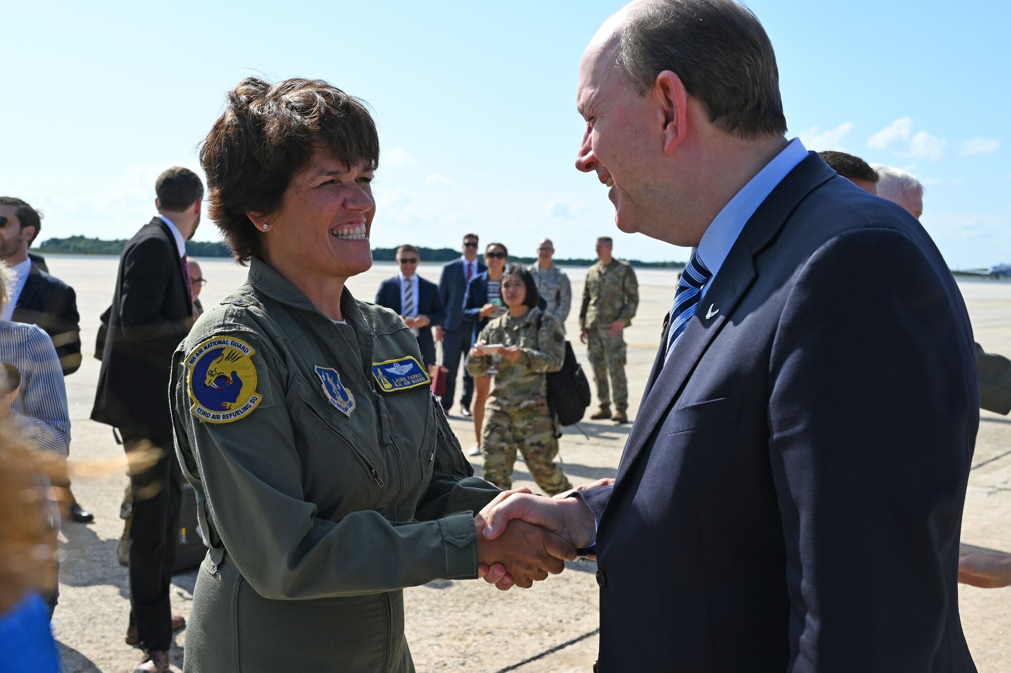 Brig. Gen. Laurie Farris, commander of the New Hampshire Air National Guard, greets Matthew Donovan, the acting secretary of the Air Force, on the flight line at Pease ANGB, Aug. 8, 2019. Dononan attended a welcoming event to commemorate the arrival of the new KC-46A air refueling tanker.  (U. S. Air National Guard photo by Staff Sgt. Charles Johnston)