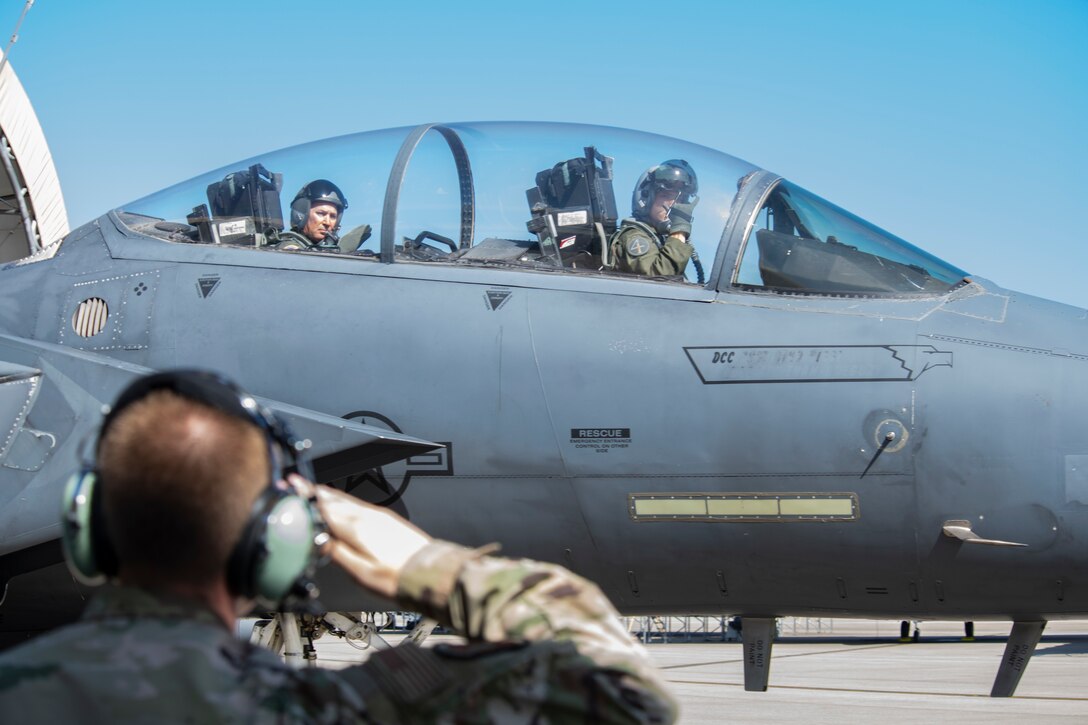 U.S. Air Force Chief Master Sgt. Benjamin W. Hedden, left, Ninth Air Force command chief, greets Senior Airman Mariah Griffin, 4th Medical Operations Squadron physical therapy specialist at the base clinic on Seymour Johnson Air Force Base, N.C., Sept. 24, 2019. During his trip, Hedden met with Airmen and listened to issues affecting Team Seymour. (U.S. Air Force photo by Staff Sgt. Michael Charles)