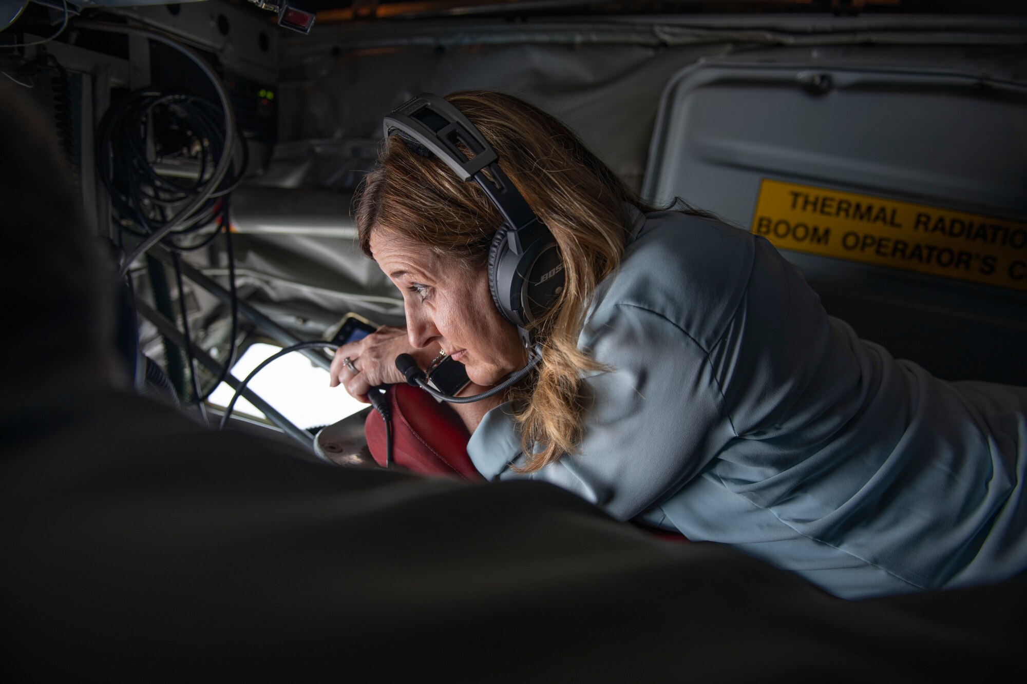 Kim Franks, the Ninth Air Force commander’s spouse, watches a group of F-15E Strike Eagles assigned to the 333rd Fighter Squadron  receive fuel from a KC-135R Stratotanker over North Carolina, Sept. 24, 2019. Ninth AF leadership and their spouses toured Seymour Johnson Air Force Base and the surrounding community to reaffirm the 4th Fighter Wing’s values of "People, Mission, Community". (U.S. Air Force photo by Airman First Class Jacob Derry)