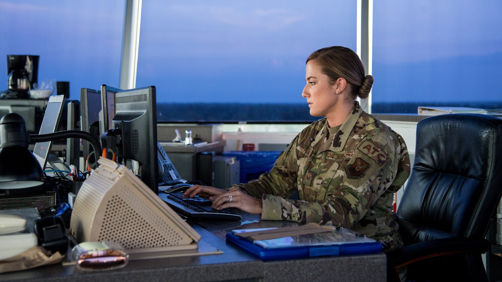 Staff Sgt. Jordan L. McFarland, 2nd Operations Support Squadron air traffic control craftsman, coordinates flight plans at Barksdale Air Force Base, Louisiana, August 22, 2019.