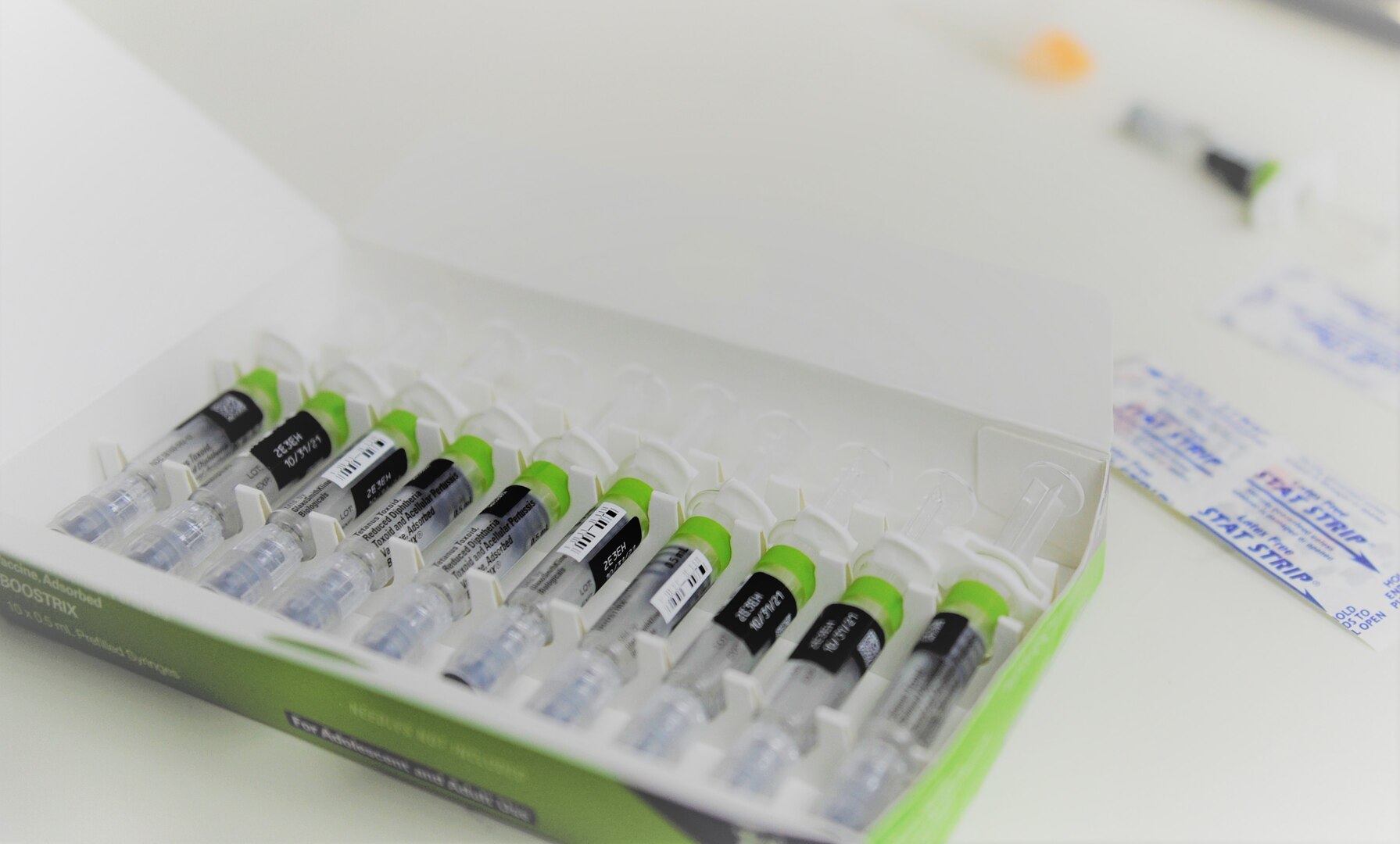 A box of vaccines sits on a table inside the immunizations clinic at Joint Base San Antonio-Randolph, Texas, Sept. 25, 2019. With flu season quickly approaching, health care professionals throughout JBSA are awaiting the arrival of this year’s influenza vaccine supplies and encouraging beneficiaries to receive their flu shots once the vaccines are available. The flu is spread throughout the year, but is most common during the fall and winter months. Influenza activity typically begins to increase in October and November, peaking during the winter months and continuing as late as May.