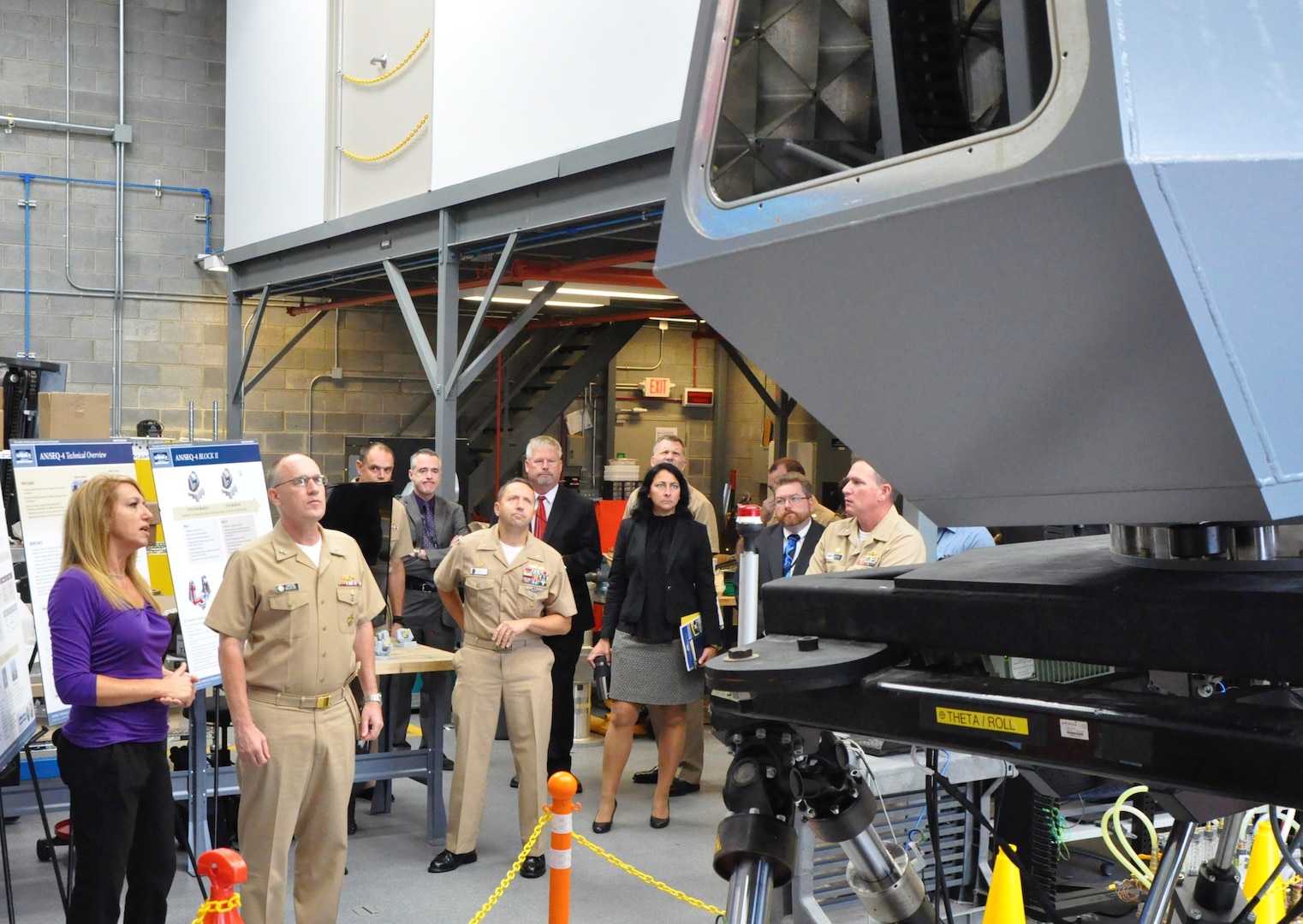 IMAGE: DAHLGREN, Va. (Sept. 6,  2019) - Theresa Gennaro, Naval Surface Warfare Center Dahlgren Division (NSWCDD) senior lead scientist for directed energy programs, briefs Rear Adm. Eugene 'Gene' Black, Surface Warfare Division director at the Office of the Chief of Naval Operations - on the Navy's high energy laser technological programs - including ODIN. The admiral was also updated on HELIOS -- High Energy Laser with Integrated Optical-Dazzler and Surveillance - during his NSWCDD tour. Gennaro was among the command's technical leaders and subject matter experts who briefed the admiral on a wide range of technologies encompassing modeling and simulation; guns and guided projectiles; Combined Integrated Air and Missile Defense Anti-Submarine Warfare; and virtualization. (U.S. Navy photo/Released)