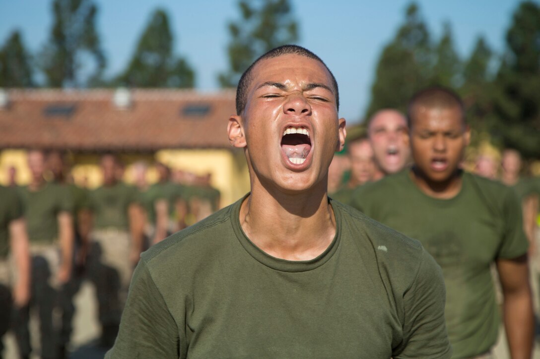 A Marine Corps recruit shouts during a training course.